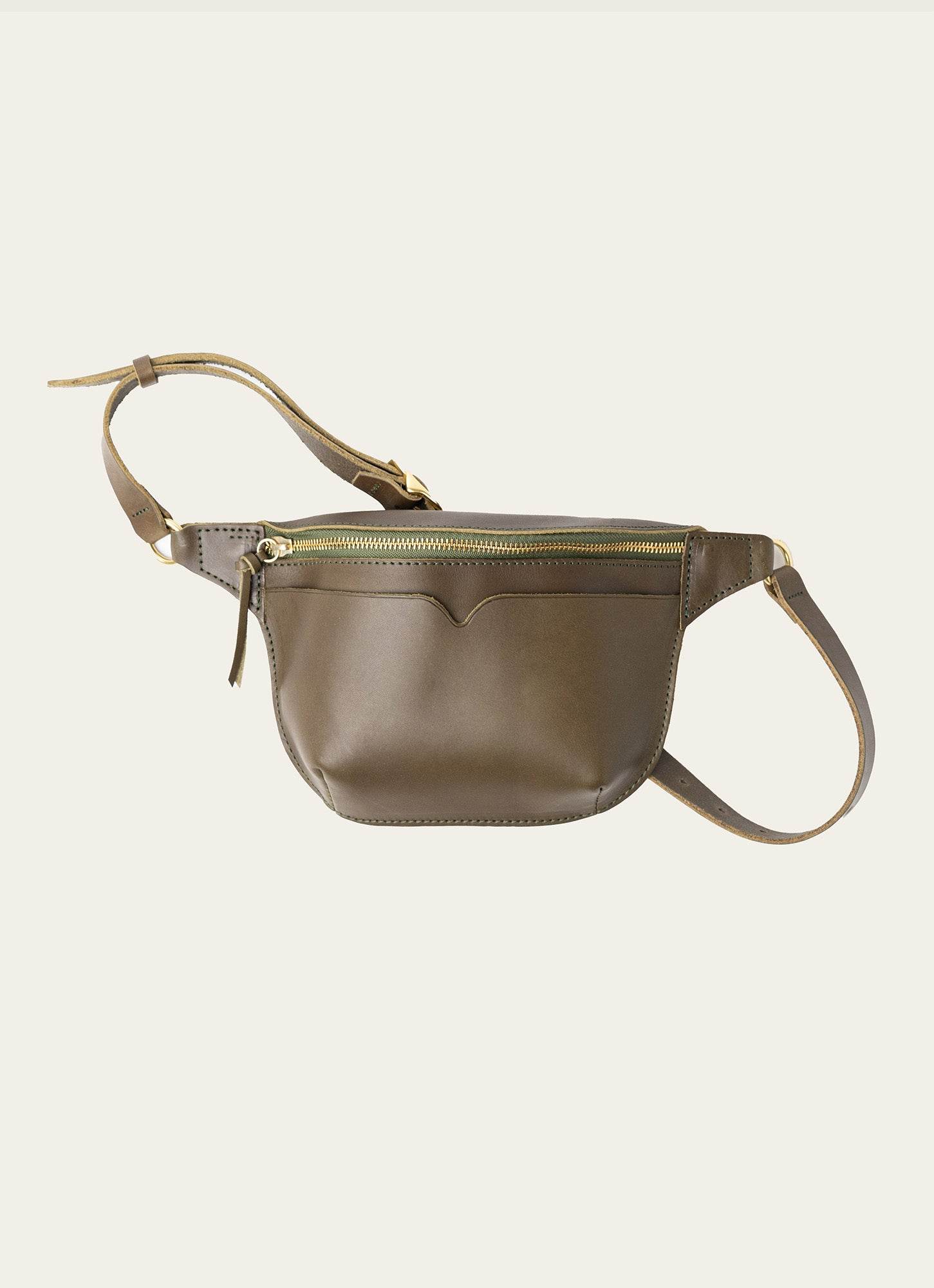 Sleek Olive green leather fanny pack with zipper and adjustable strap, ideal for stylish hands-free storage and everyday essentials.